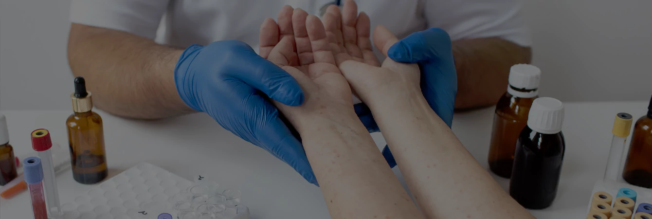 A doctor consults a patient about their pain treatment